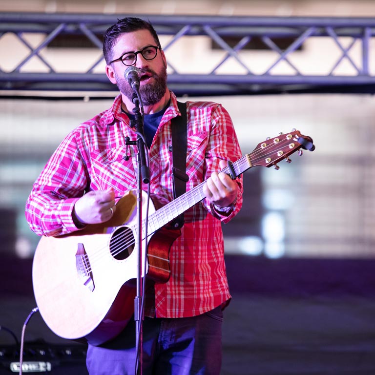 man playing guitar