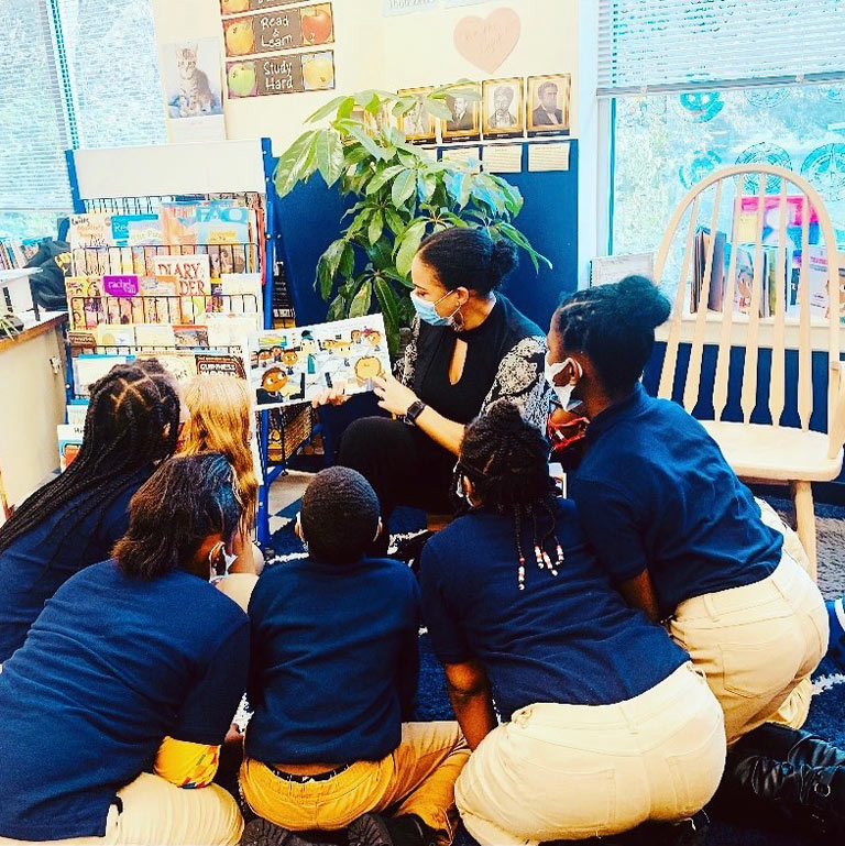 Willis reading to her students