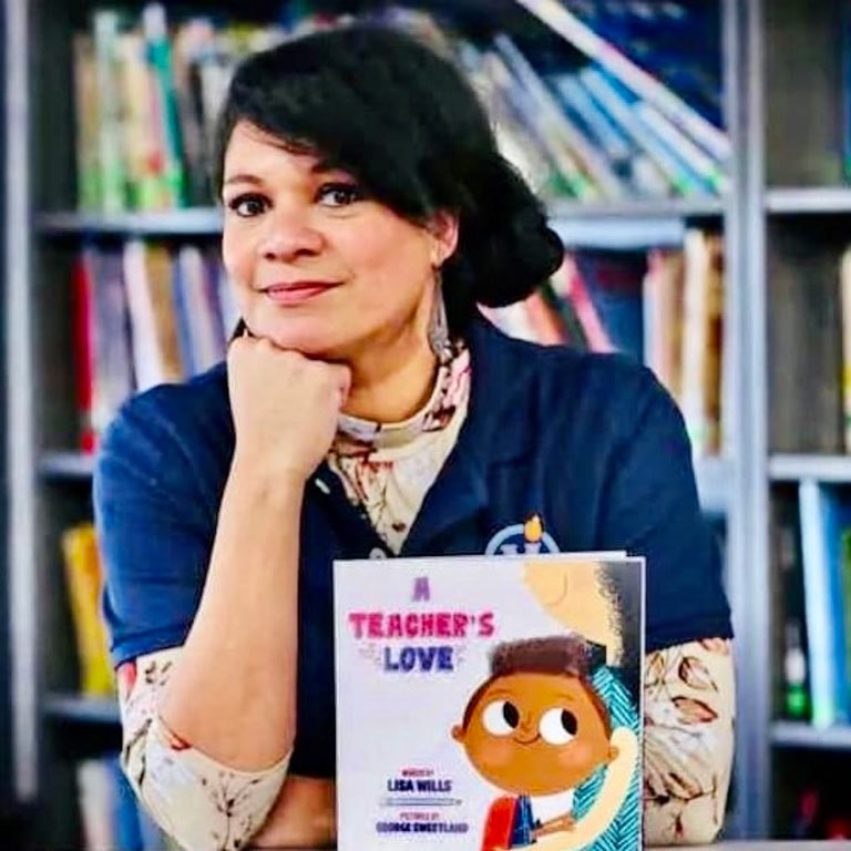 Lisa Willis with her book, A Teacher's Love